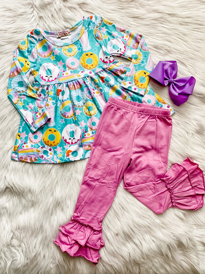 Girls two piece set with pink ruffle leggings and tunic top with Easter donuts and milkshakes. 
