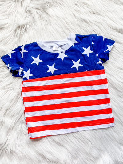 Kids july 4th t-shirt with american flag. White stars with a blue background on the top and red and white lines on the botom. Short sleeve t-shirt. Girls patriotic tee. Boys american flag shirt.