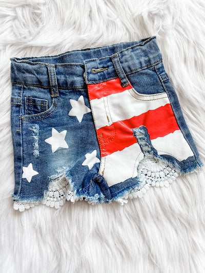 Girls distressed lace denim shorts with leather white stars and red and white stripes. 