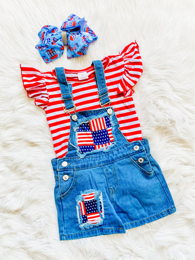 Girls two piece set with denim overalls with American flag patches and matching red and white striped flutter sleeve shirt. 