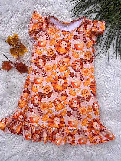 Adorable girls thanksgiving nightgown with sweet little turkeys, PSL, pumpkins, and fall fun. Thanksgiving matching sibling pajamas from Tulips and Twirls Boutique in Orlando, Florida.