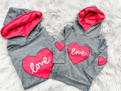 Super cute Mommy and Me Valentine's Day Hoodies with heart patches on elbows and love patch on front.