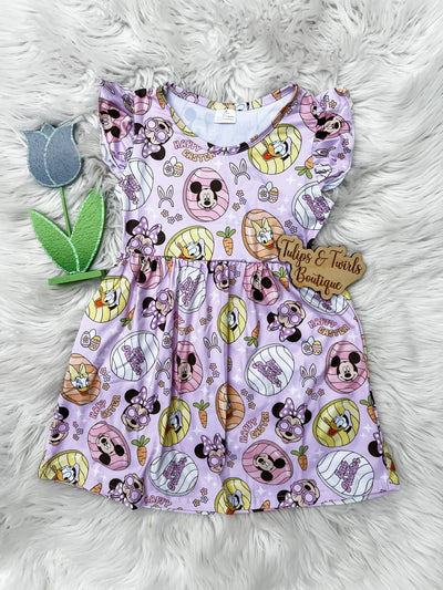 Easter flutter sleeve dress for girls with all over mouse ears, donald, and mother mouse friends in sweet easter eggs.