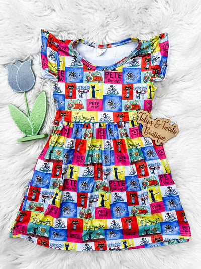 Read Across America dress featuring Pete on a Bike. Adorable flutter sleeve dress for girls with all over reading pal.