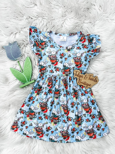 Meet Alice in this adorable teacups print Flutter Sleeve Dress for girls.