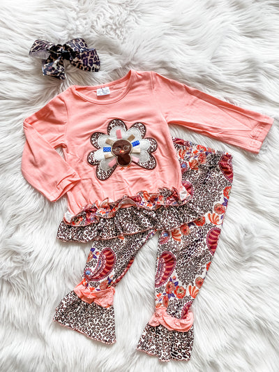 Girls Bell Bottom Thanksgiving long sleeve outfit with embroidered turkey on peach shirt and cheetah print. 