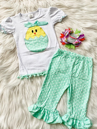 Girls two piece easter outfit with short sleeve shirt with embroidered hatching baby chick on front and coordinating elastic waist green polka dot pants. Girls Easter Outfit