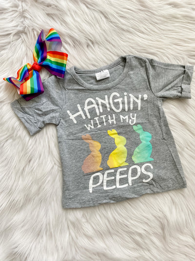 Grey kids short sleeve tshirt with rainbow bunny rabbits and Hangin With My Peeps written in white. 