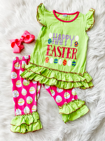 Girls two piece pants set with lime green ruffle top that says Happy Easter and pink pants with green ruffle hem and colorful eggs. 