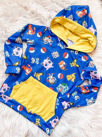 Blue and yellow unisex kids hoodie with popular catchable creatures. 