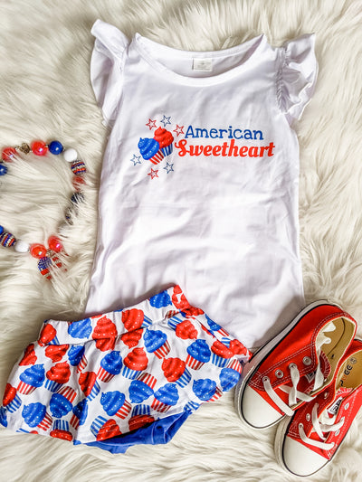 Girls cupcake bummie set with patriotic red white and blue themed cupcakes on bummie and white flutter sleeve tank with aerican sweetheart graphic print on the front